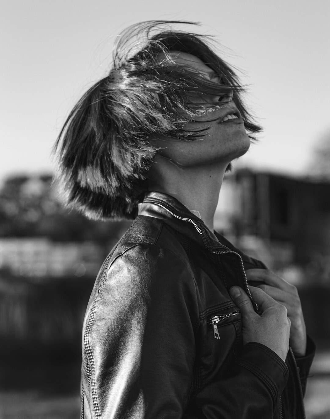Elegant portrait of an Argentine actress in a tailored dark coat